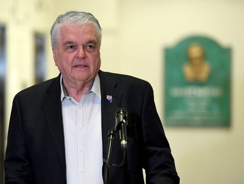 Nevada Governor Steve Sisolak speaks to an assembled group