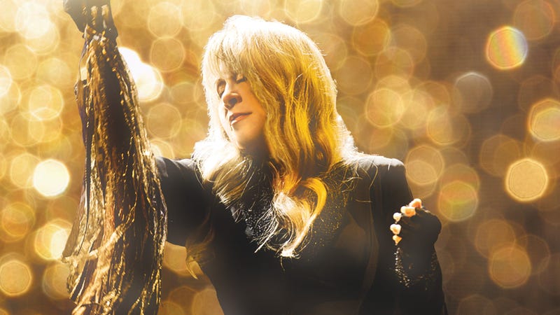 Stevie Nicks on gold background