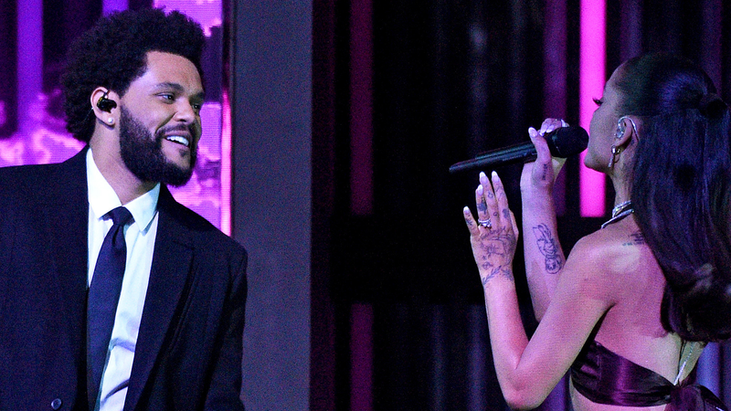 The Weeknd and Ariana Grande perform onstage