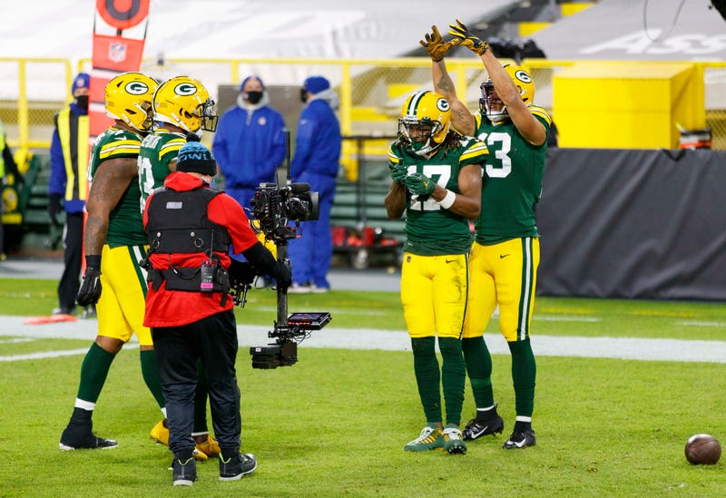 Nov 29, 2020; Green Bay, Wisconsin, USA; Green Bay Packers wide receiver Davante Adams (17) celebrates for the TV camera after catching a touchdown pass during the first quarter against the Chicago Bears at Lambeau Field. Mandatory Credit: Jeff Hanisch-USA TODAY Sports
