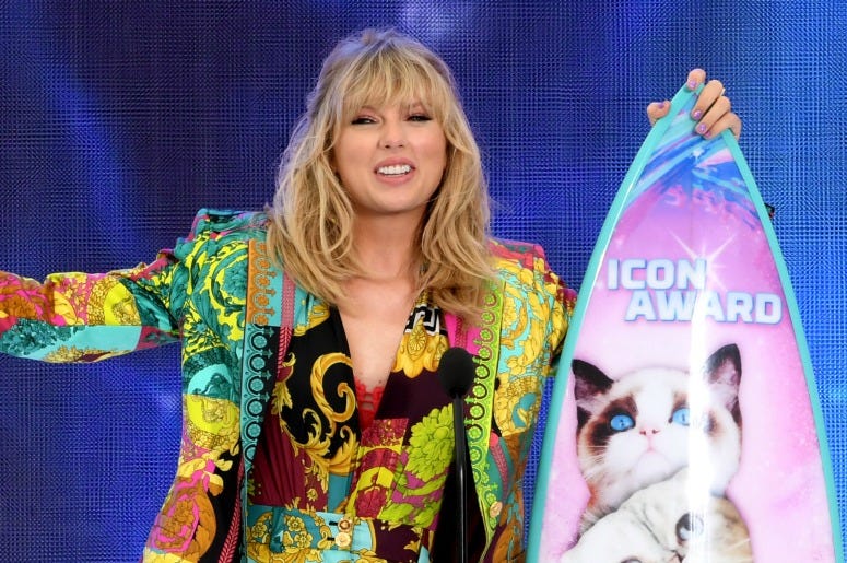 Taylor Swift accepts the Teen Choice Icon Award onstage during Fox's Teen Choice Awards.