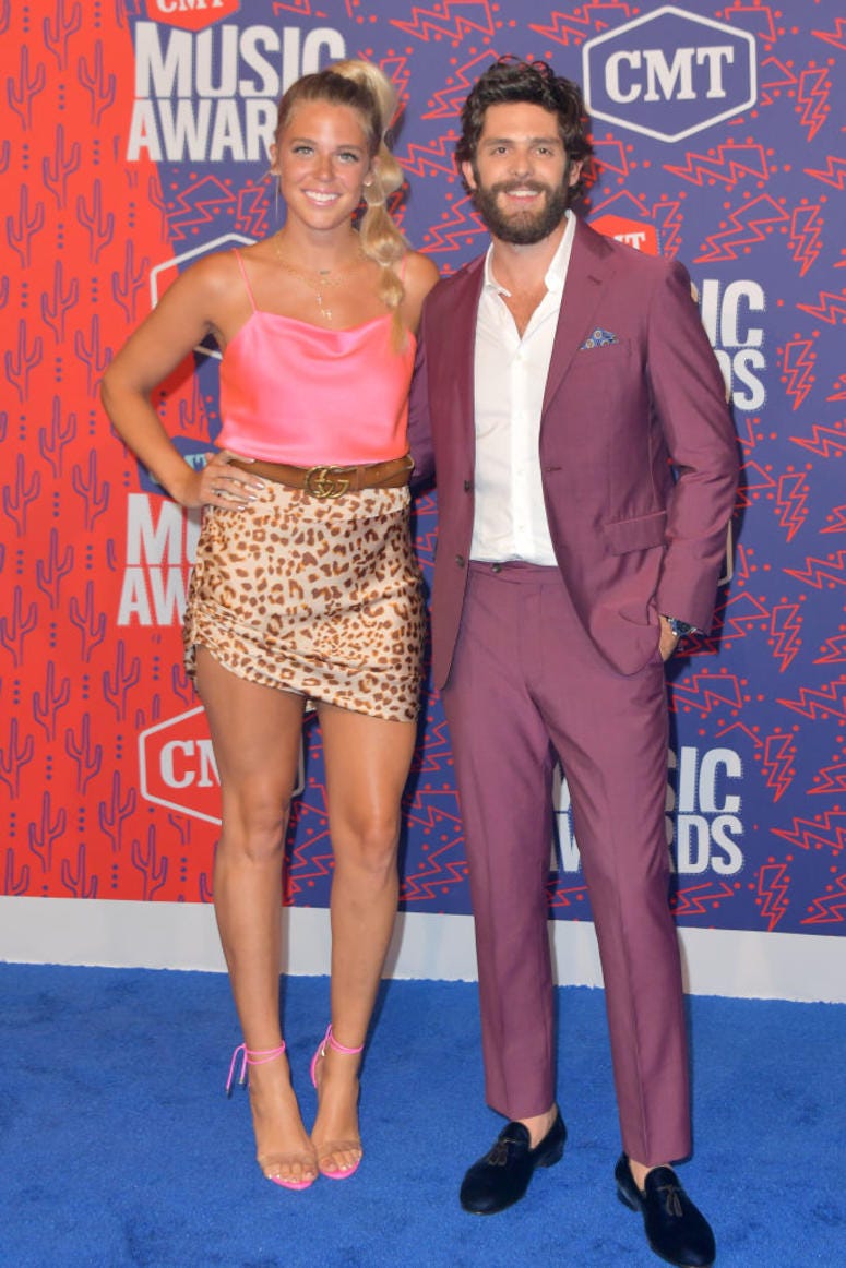 Lauren Akins and Thomas Rhett attend the 2019 CMT Music Awards - Arrivals at Bridgestone Arena on June 05, 2019 in Nashville, Tennessee