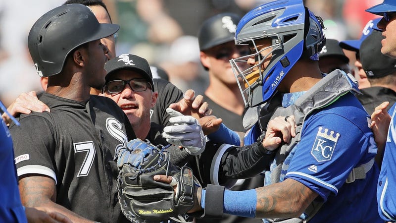 Tim Anderson of the Chicago White Sox argues with the Kansas City Royals after getting hit by a pitch.