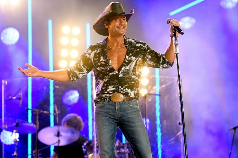 Tim McGraw performs on stage