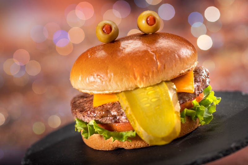 The special food and beverage offerings for the 50th Anniversary of Walt Disney World are full of whimsy and EARidescent shimmer. Many are also inspired by Walt’s personal recipes, beloved Disney characters, nostalgic dishes, and Disney attractions past and present, like the The Toad Burger available at Friar’s Nook at Magic Kingdom Park at Walt Disney World Resort in Lake Buena Vista, Fla. (Kent Phillips, photographer).
