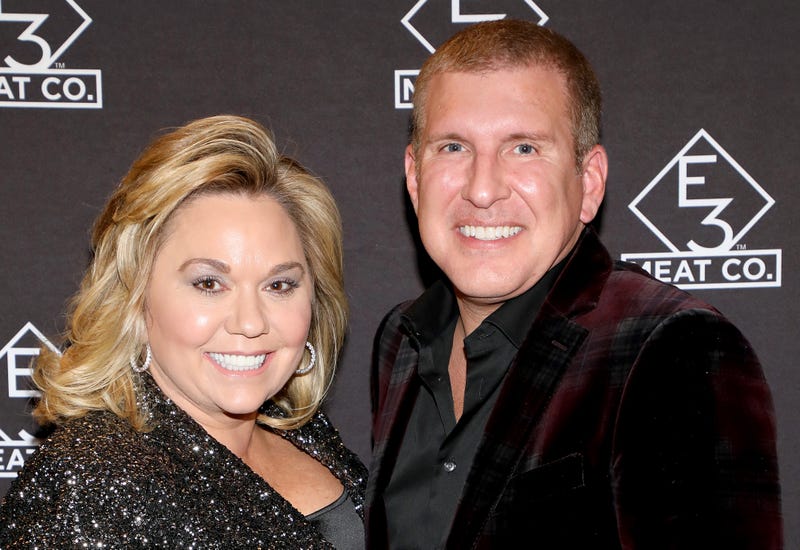 Julie Chrisley (L) and Todd Chrisley attend the grand opening of E3 Chophouse Nashville on November 20, 2019 in Nashville, TN.