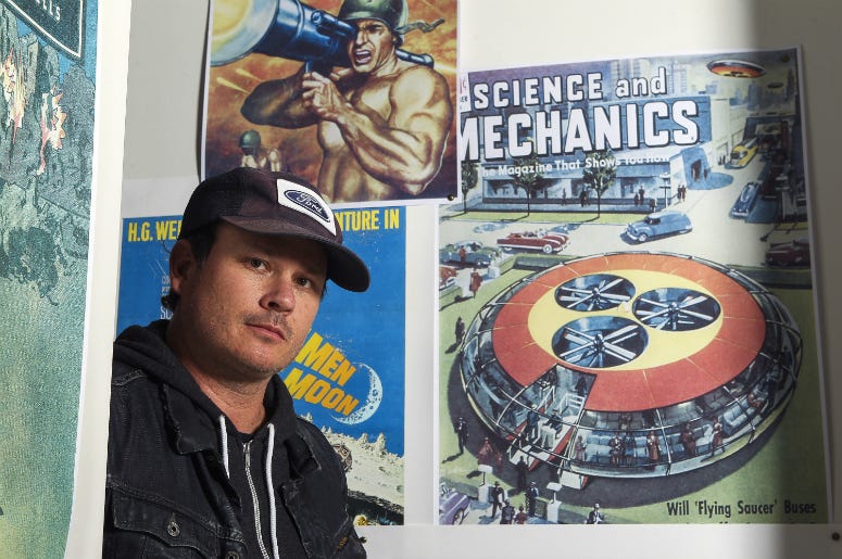 Tom DeLonge poses for a portrait in his shop To the Stars.