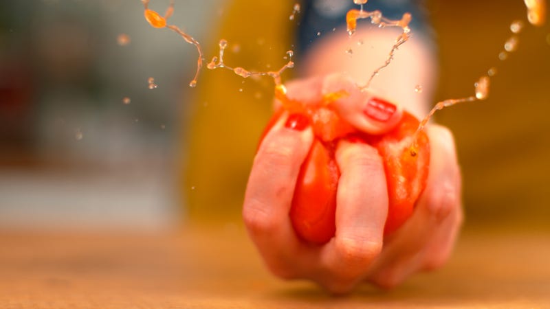 Squeezing Tomato