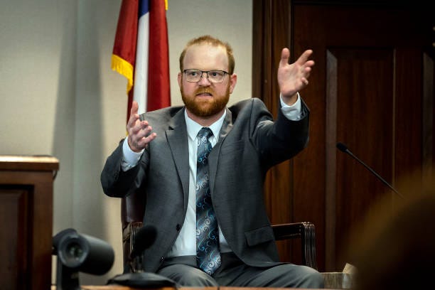 Travis McMichael testified Wednesday that he was in a fight for his life when he encountered Ahmaud Arbery in February 2020.