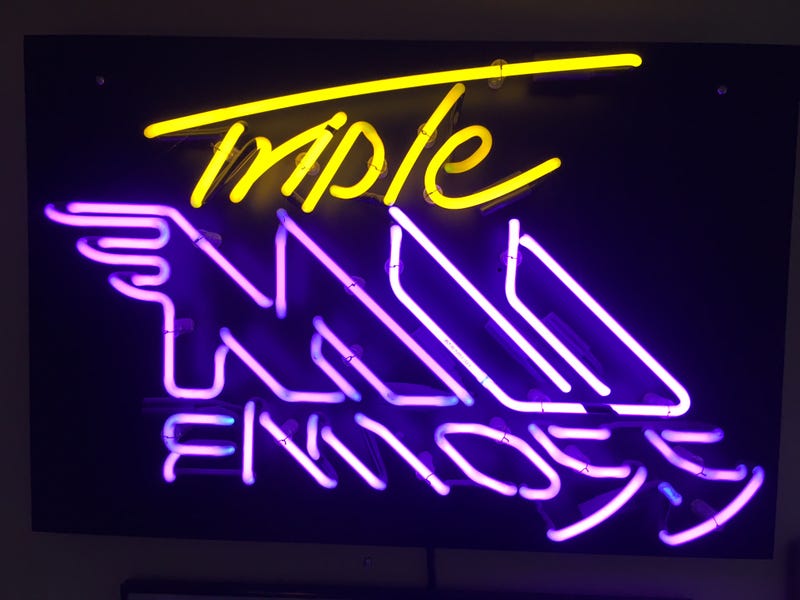 first Triple M logo, in neon light form