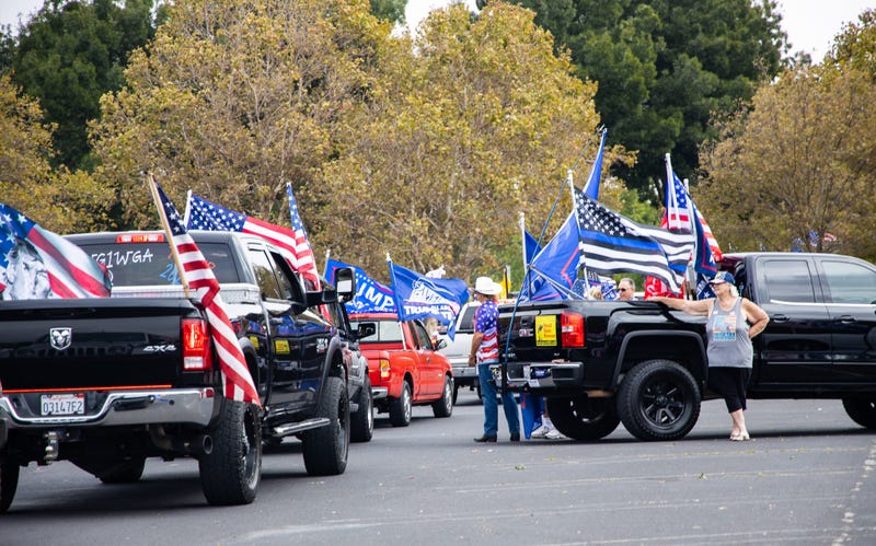 Trump supporters gather in the parking lot of Stoneridge Mall.