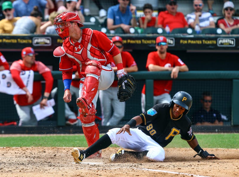 Lolo Sanchez slides into home