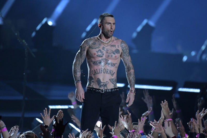 adam levine on stage