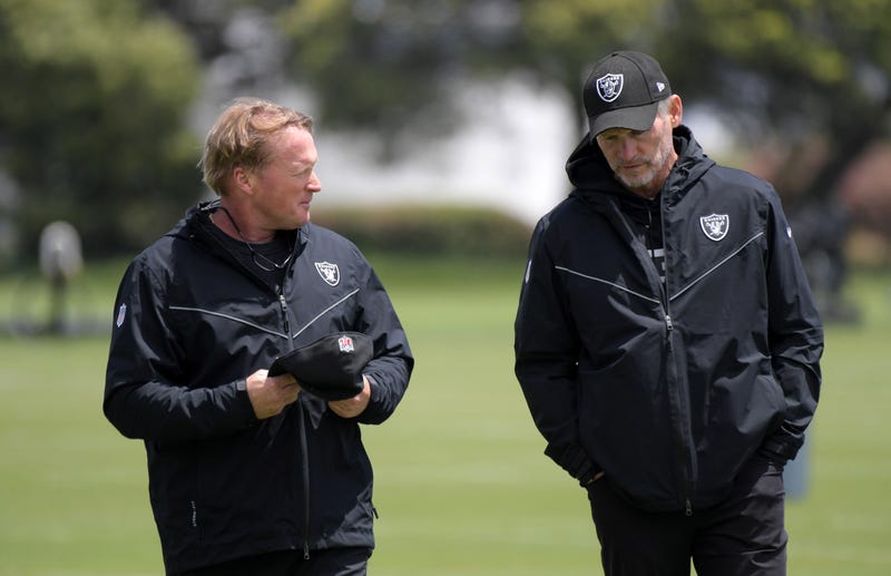Jon Gruden (left) and Mike Mayock (right) are in a difficult situation with wide receiver Antonio Brown.