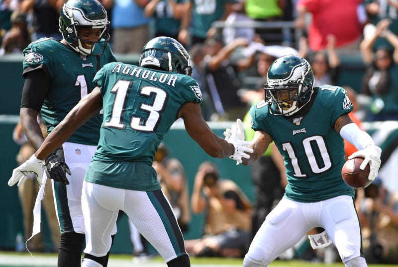DeSean Jackson (right) celebrates a touchdown with his teammates Nelson Agholor and Alshon Jeffery.