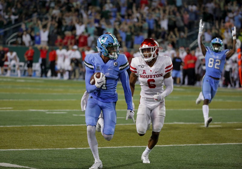 Tulane Green Wave wide receiver Jalen McCleskey (1) runs after a catch for a touchdown past Houston Cougars cornerback Damarion Williams (6) during the fourth quarter at Yulman Stadium. Mandatory Credit: Derick E. Hingle-USA TODAY Sports