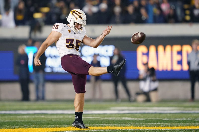 Draft hopeful Michael Turk uncorks a punt for Arizona State