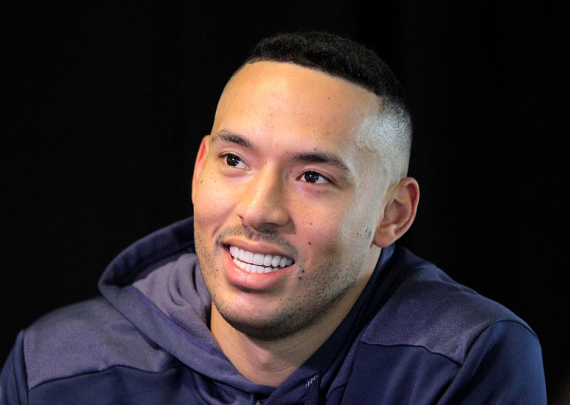 Carlos Correa speaks to the media prior to working out