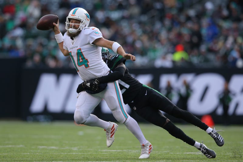The Dolphins lost a close game to the Jets.