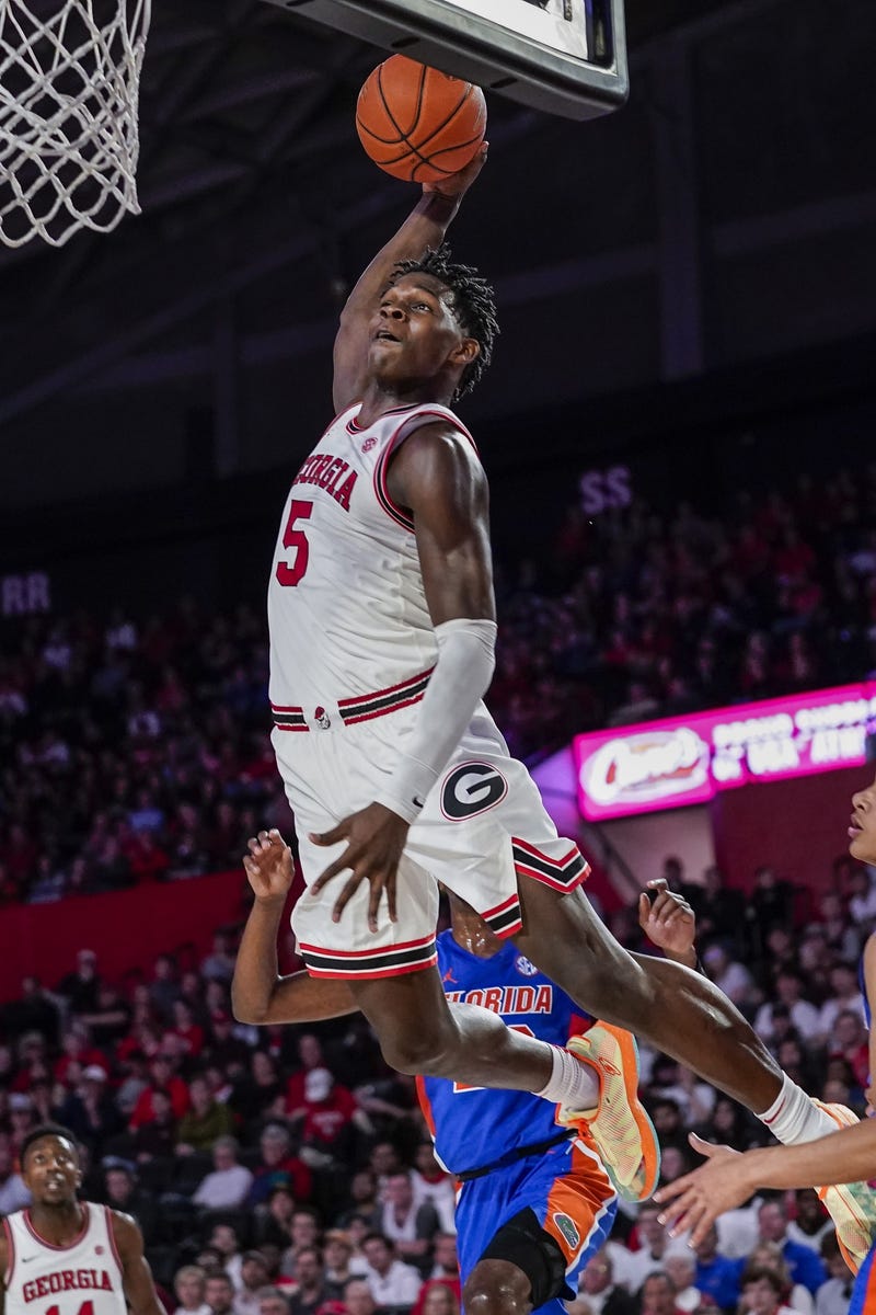 Georgia Bulldogs guard Anthony Edwards (5) dunks the ball against the Florida Gators during the second half at Stegeman Coliseum.