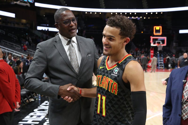 Hawks star Trae Young with former NBA star Dominique Wilkins.