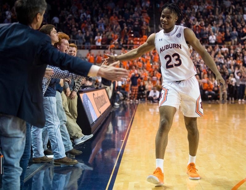 Auburn forward Isaac Okoro (23) high five fans at Auburn Arena in Auburn, Ala., on Wednesday, Jan. 8, 2020. Auburn defeated Vanderbilt 83-79.