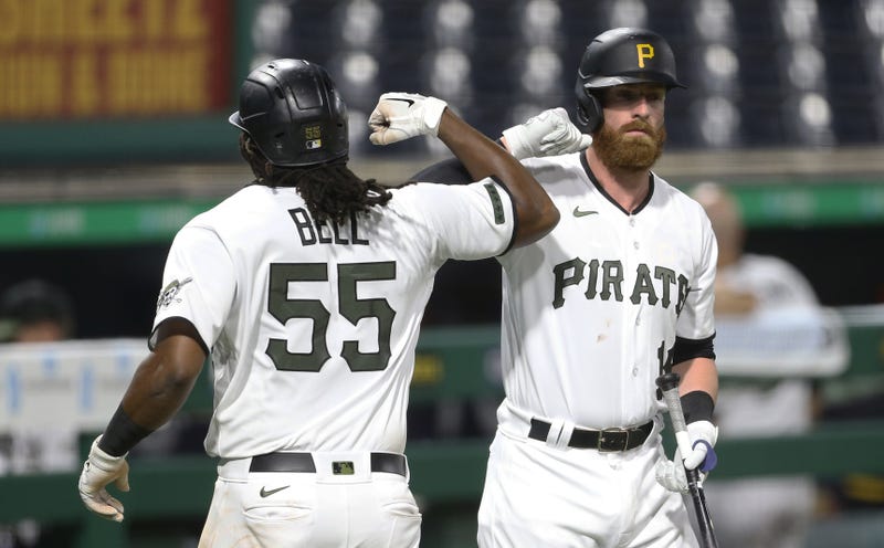 Josh Bell & Colin Moran arm bump