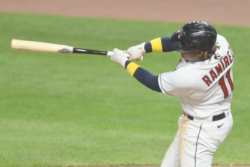 Cleveland Indians third baseman Jose Ramirez (11) hits a two run home run in the fifth inning against the Milwaukee Brewers at Progressive Field.