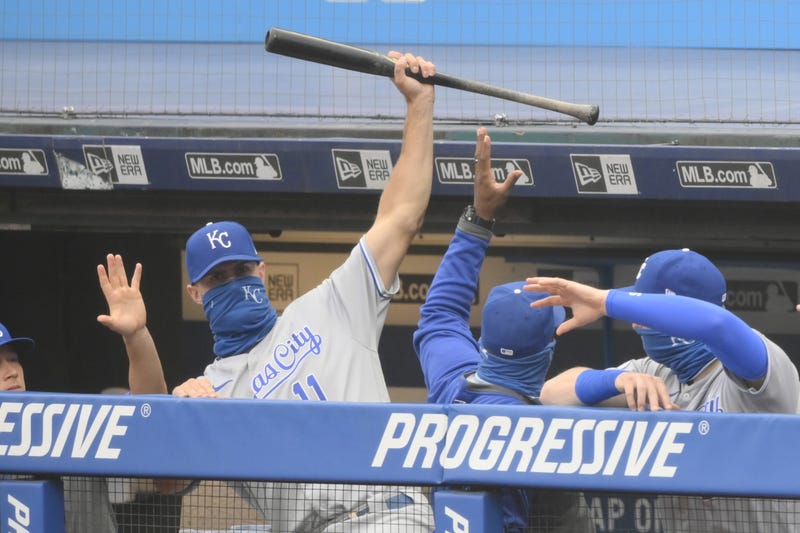Kansas City Royals center fielder Bubba Starling (11) catches the bat of shortstop Adalberto Mondesi (27) who lost control of it on a swing in the first inning against the Cleveland Indians at Progressive Field.