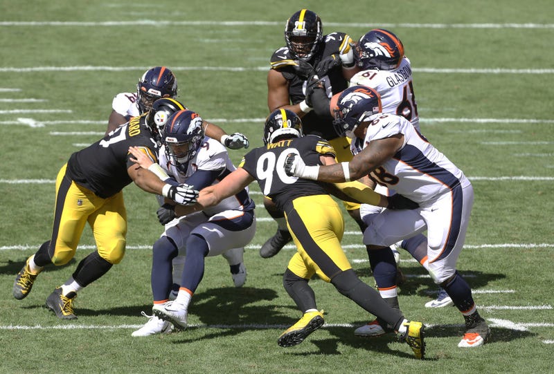 quarterback Jeff Driskel (9) is sacked by Pittsburgh Steelers defensive tackle Cameron Heyward (97) and outside linebacker T.J. Watt (90)
