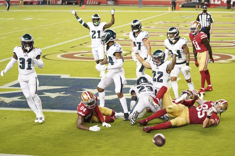 Philadelphia Eagles players celebrate after an incomplete pass by the San Francisco 49ers during the fourth quarter at Levi's Stadium.