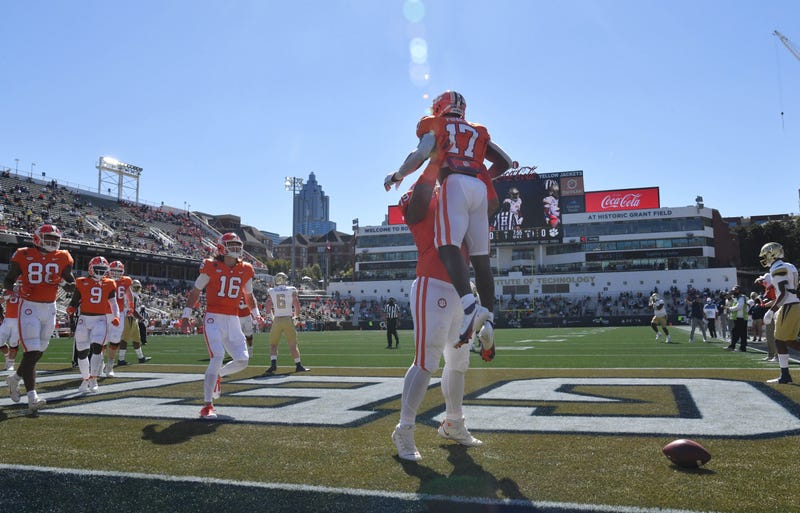 Clemson wide receiver Cornell Powell (17) celebrates after he made a touchdown pass over Georgia Tech defensive back Tre Swilling (3) during the first half of an NCAA college football game at Bobby Dodd Stadium.