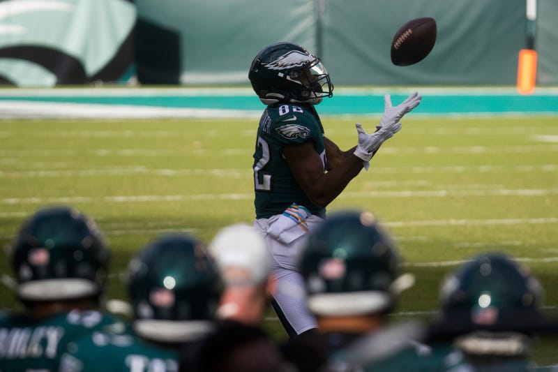 Eagles' John Hightower (82) makes a reception Sunday, Oct. 18, 2020