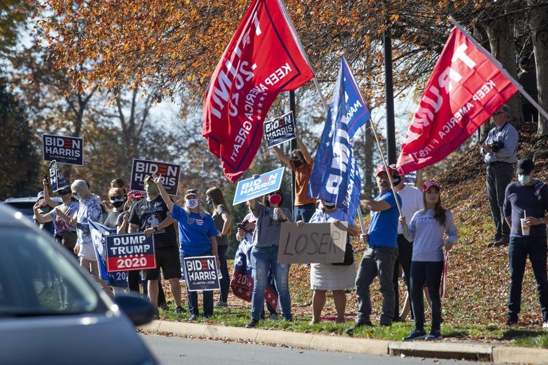 Crowds gather outside the Trump National Golf Club in Sterling, Virginia, when President Donald Trump was seen golfing on Nov. 7, 2020. Photo credit Jack Gruber-USA TODAY