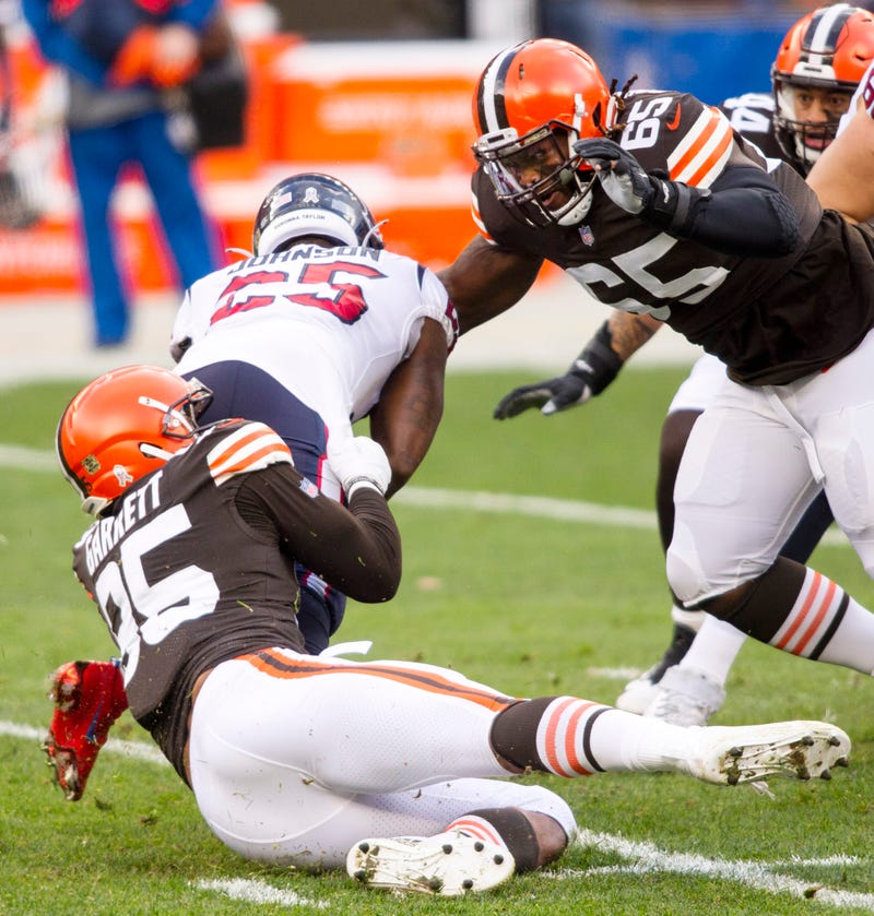 Myles Garrett and Larry Ogunjobi