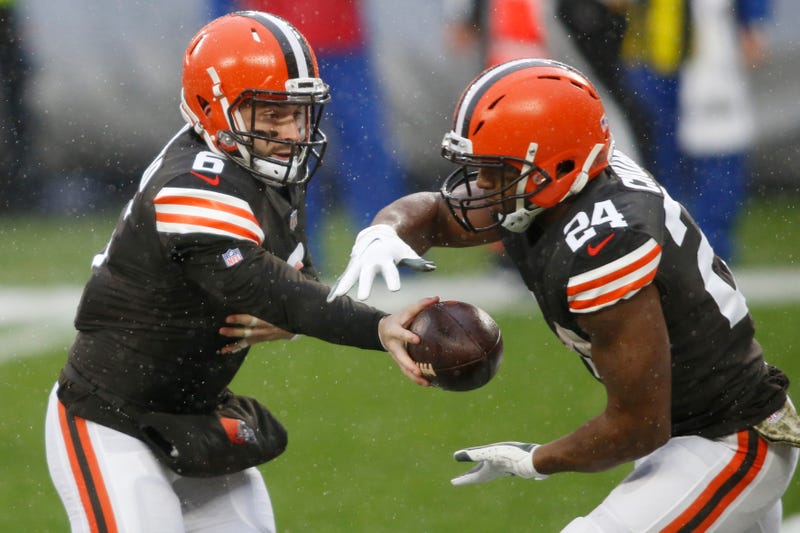 Cleveland Browns quarterback Baker Mayfield (6) hands off to running back Nick Chubb (24) during the first quarter against the Philadelphia Eagles at FirstEnergy Stadium.