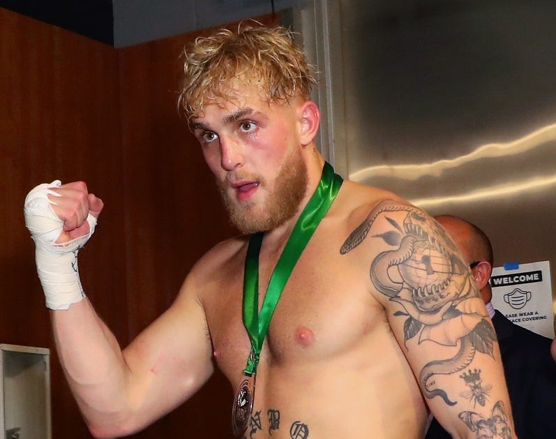 Mayweather & Logan Paul share words at press conference