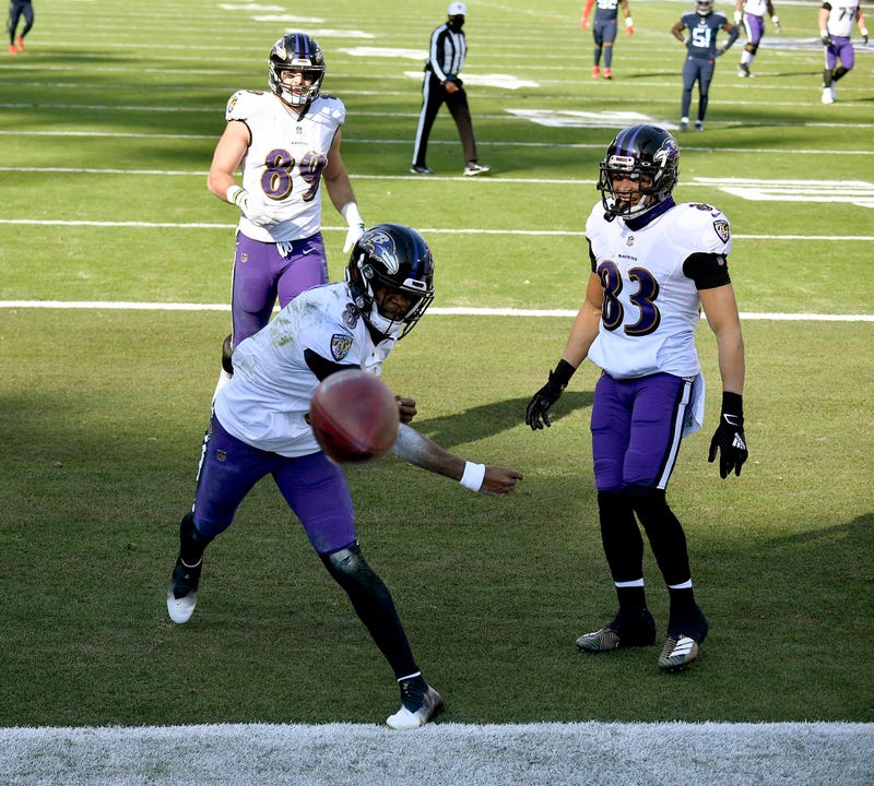 Lamar Jackson celebrates a 48-yard TD run during the Ravens 20-13 victory over the Titans.