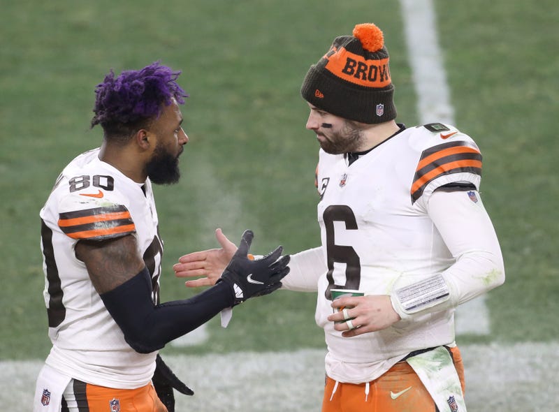 Cleveland Browns quarterback Baker Mayfield (6) celebrates with wide receiver Jarvis Landry (80) on the sideline against the Pittsburgh Steelers in the fourth quarter of an AFC Wild Card playoff game at Heinz Field.