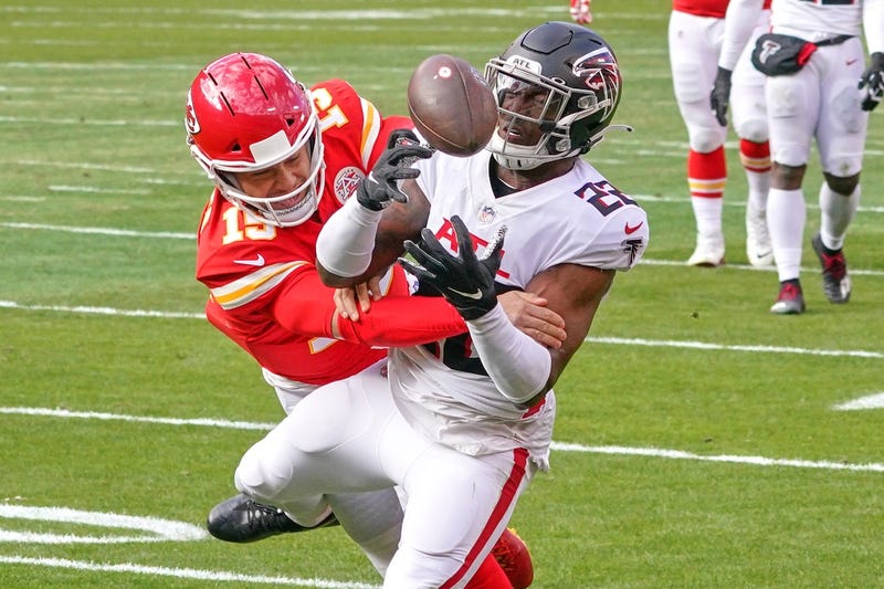 Atlanta Falcons strong safety Keanu Neal (22) intercepts a pass intended for Kansas City Chiefs quarterback Patrick Mahomes (15) during the game at Arrowhead Stadium.