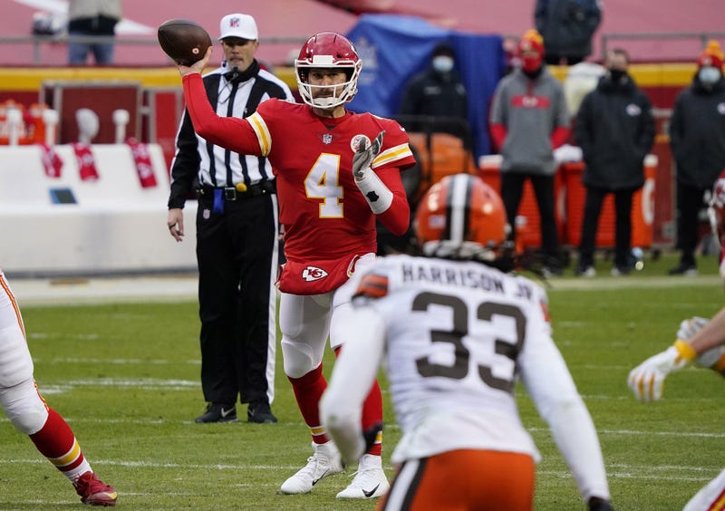 Kansas City Chiefs quarterback Chad Henne (4) throws against the Cleveland Browns during the second half in the AFC Divisional Round playoff game at Arrowhead Stadium.