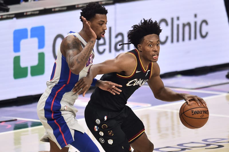 Jan 27, 2021; Cleveland, Ohio, USA; Cleveland Cavaliers guard Collin Sexton (2) dribbles against Detroit Pistons guard Delon Wright (55) during the first quarter at Rocket Mortgage FieldHouse.