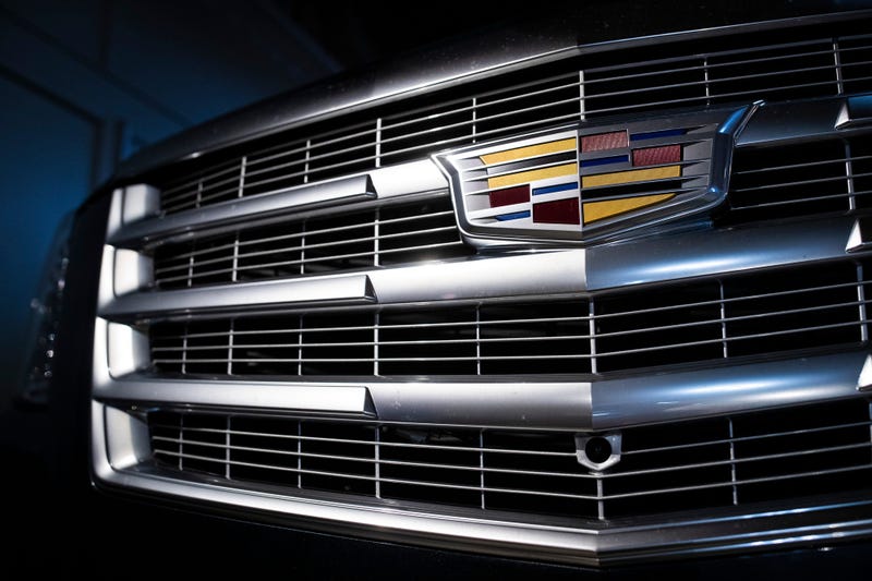 The Detroit automaker announced the recall of roughly 484,000 large SUVs in the U.S. over a problem that can cause the third-row seat belts to malfunction.