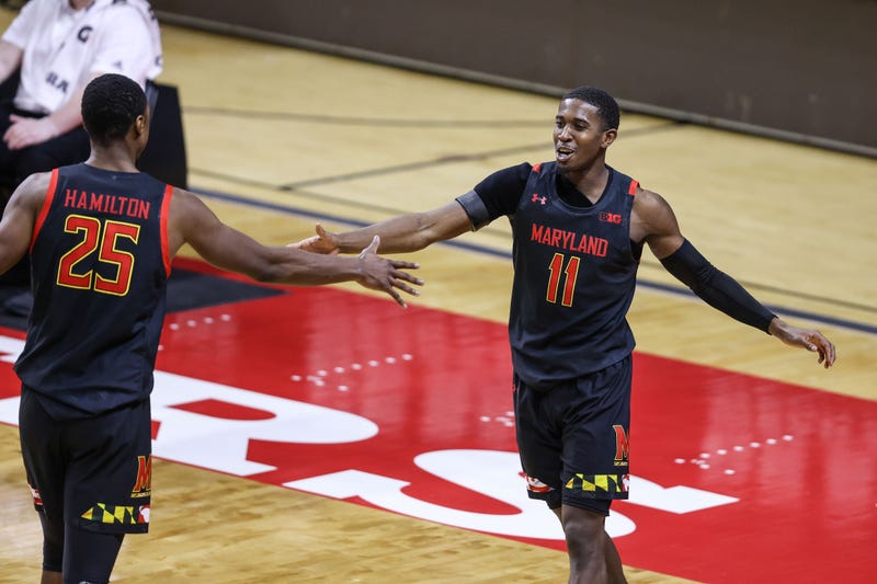 Darryl Morsell and Jarius Hamilton celebrate a big play during MD's 68-59 win over Rutgers.