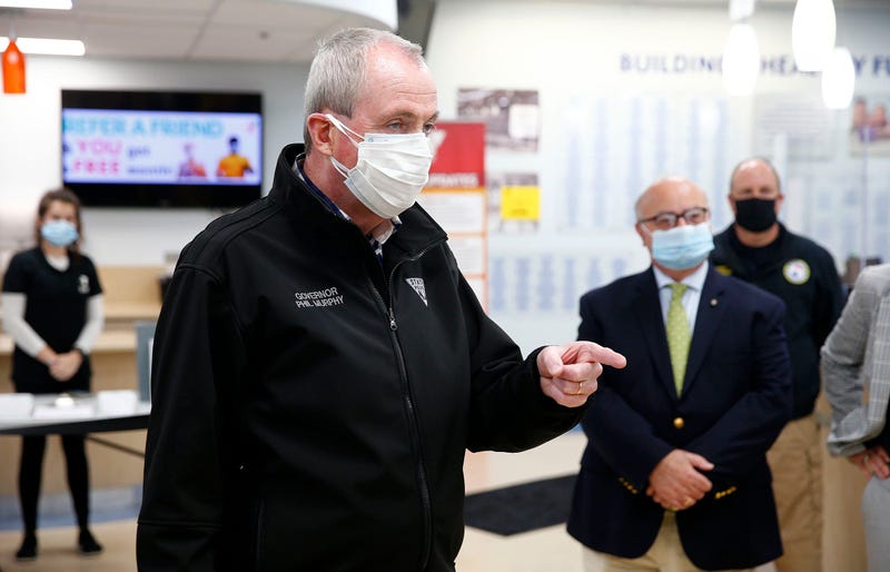 Gov. Phil Murphy speaks in the lobby of the YMCA of Greater Monmouth County in Red Bank Friday, April 16, 2021, before he toured the COVID-19 vaccination site there