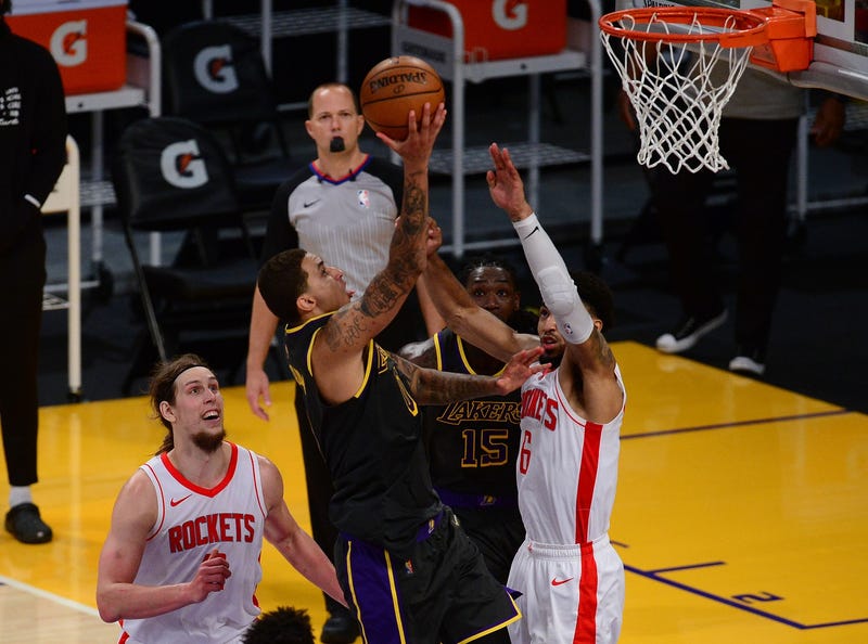 Los Angeles Lakers forward Kyle Kuzma (0) moves to the basket against Houston Rockets forward Kenyon Martin Jr. (6) during the second half at Staples Center.