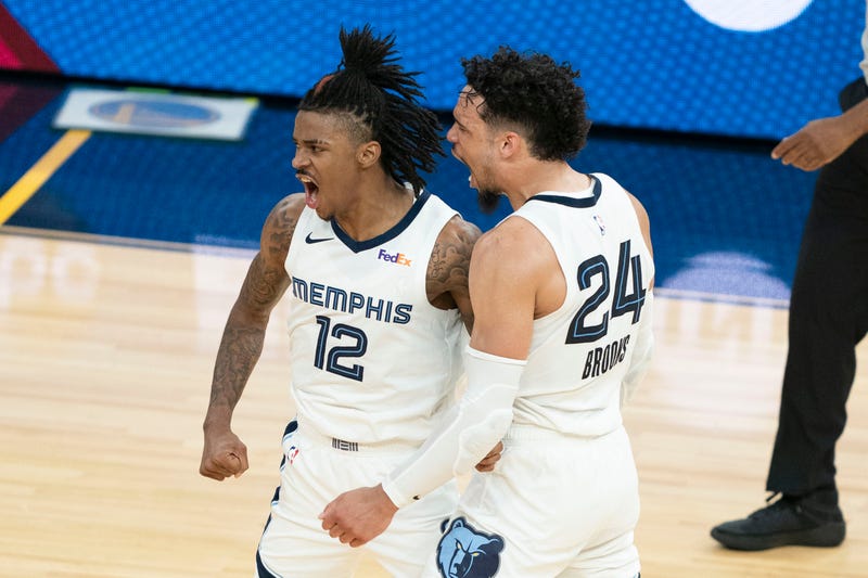Memphis Grizzlies stars Ja Morant and Dillon Brooks on the court.