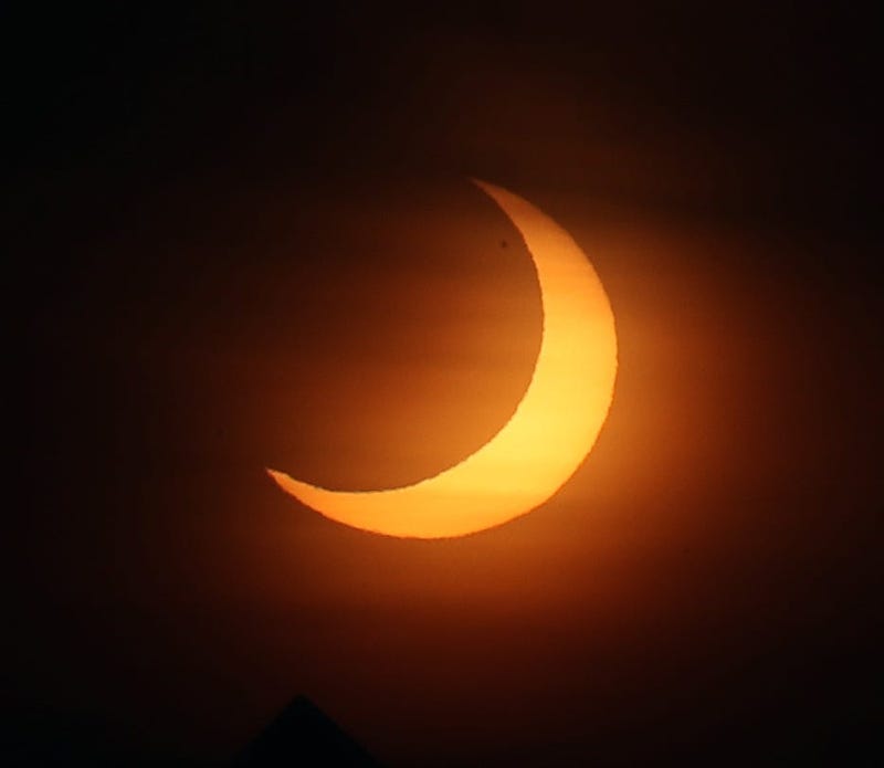 The partial solar eclipse over Putnam County on Thursday morning