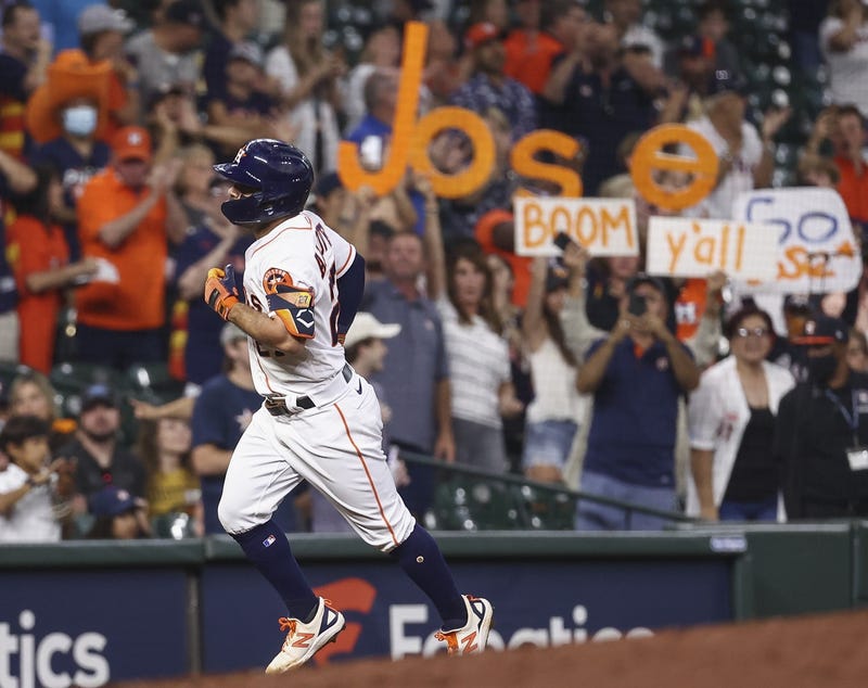 Houston Astros second baseman Jose Altuve (27) rounds the bases after hitting a home run during the third inning against the Cleveland Indians at Minute Maid Park.