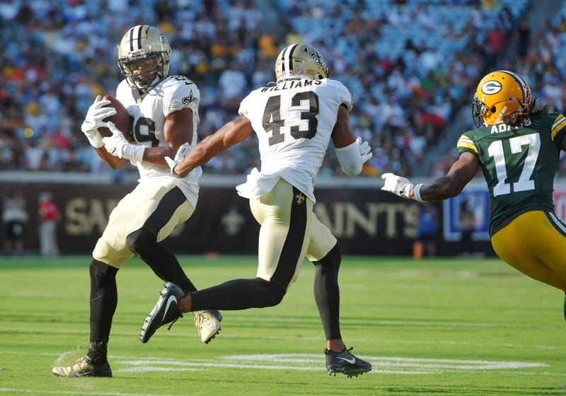 Saints cornerback Paulson Adebo intercepts Aaron Rodgers